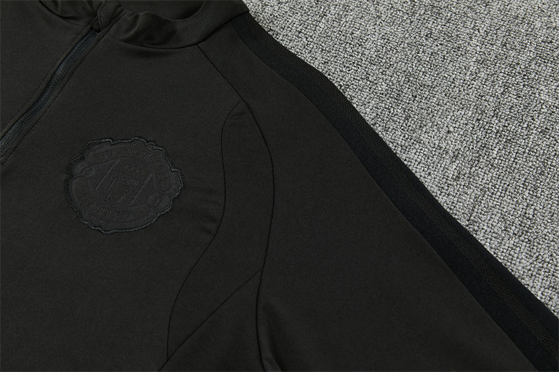 26 27   Manchester United Tracksuit 1